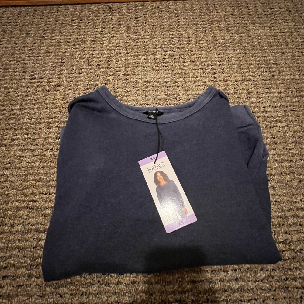 blue crewneck sweatshirt